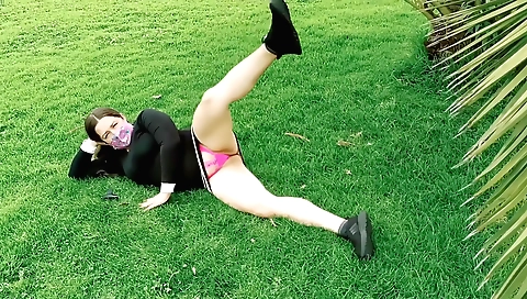 Gorgeous brunette is outdoors and fucking on her own