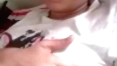 Slutty brunette with big boobies shows them up for a guy