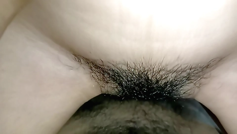 Indian brunette is getting her hairy pussy penetrated