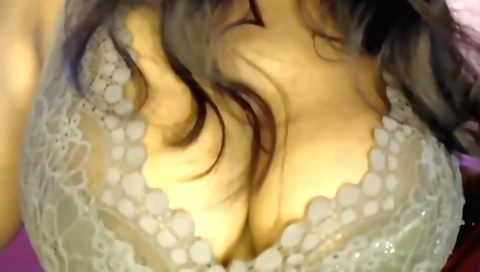 Horny brunette in sexy lingerie seduces and rides a dildo