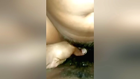 Indian slut with a hairy pussy is giving him a blow job