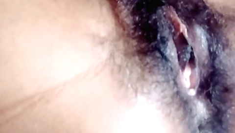 A cute girl fucks her hairy body in solo porn videos