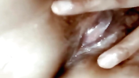 Busty Indian milf fucks her pussy in homemade amateur