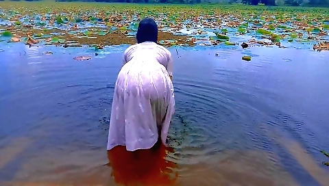 Schoolgirl with a sexy body is playing with a towel