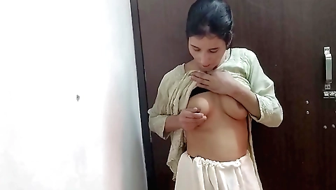 Solo female 18+ with natural curves wears a white blouse