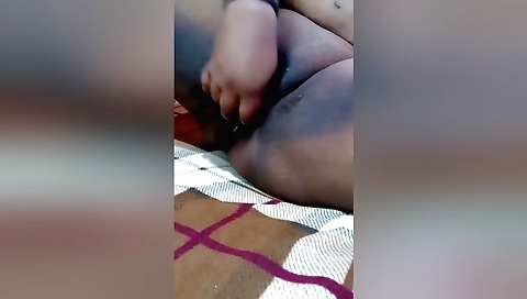 Indian brunette masturbates with cucumber and a toy