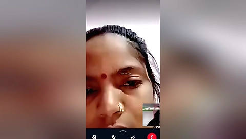 Chubby bhabhi with big tits is showing off on web camera