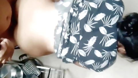 Amateur brunette getting her pussy fucked in the kitchen