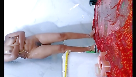 Horny amateur brunette masturbates in the bathroom