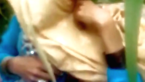 Busty indian milf in a pink bikini in the outdoor porn