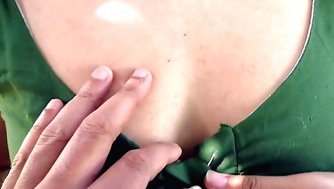 Young stepmom is sitting on a chair in her stepmom's room