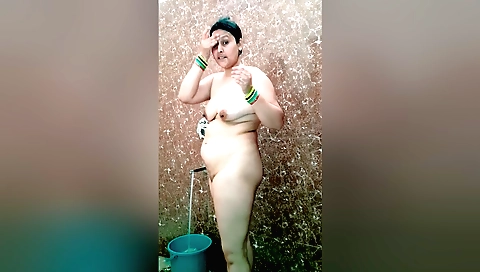 Brunette mature is showing off naked in a bathroom