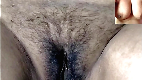 Indian girl takes her water bowl and drinks it on the bed