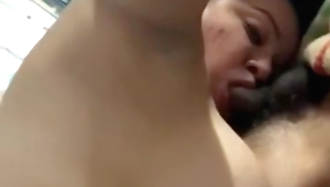 Amateur brunette is sucking on her neighbor's cock