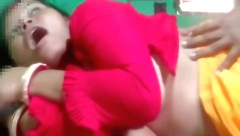 Big tit brunette in a red dress is showing her sexy legs