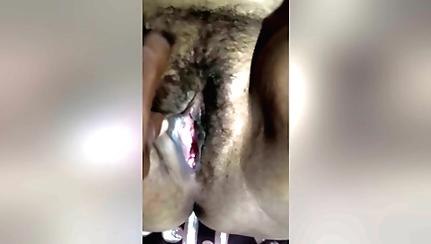 Indian girl is dripping with juices in her hairy pussy