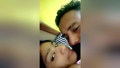 Hot brunette in webcam shows herself in the hotel room